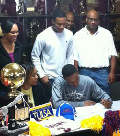 Athletes First James Woodard of Edmond Memorial High School signs a letter of intent to the University Of Tulsa